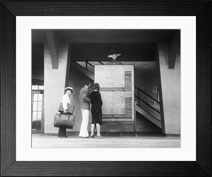 Framed Print : Couple Reading Pan American Airways Bulletin Board Framed Print : Couple Reading Pan American Airways Bulletin Board