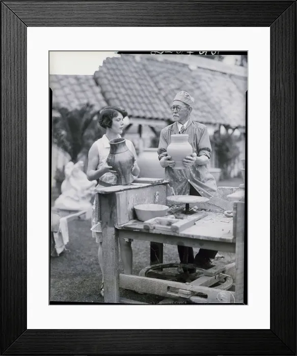 Framed Print : Man, Woman At Old Foot-Driven Pottery Wh Framed Print : Man, Woman At Old Foot-Driven Pottery Wh