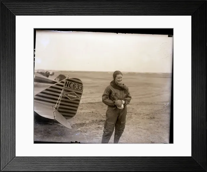 Framed Print : Alicia Patterson Stands Behind Biplane Framed Print : Alicia Patterson Stands Behind Biplane