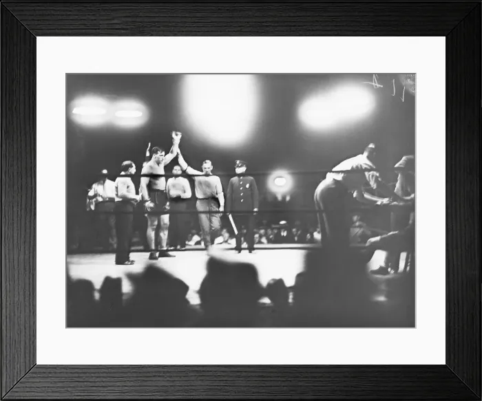 Framed Print : Referee Declares Primo Carnera the Winner Framed Print : Referee Declares Primo Carnera the Winner