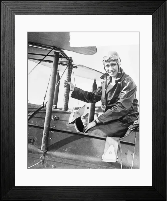 Framed Print : Pilot Amy Johnson in Airplane Cockpit