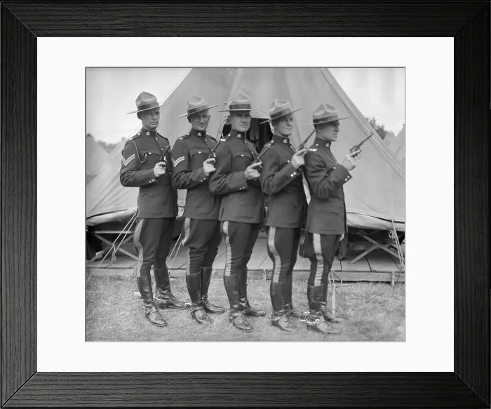 Framed Print : Canadian Mounted Police Holding Guns Framed Print : Canadian Mounted Police Holding Guns