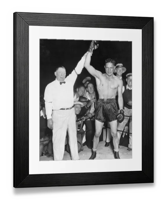 Framed Print : Referee Holds Max Baer's Hand Up In Victory Framed Print : Referee Holds Max Baer's Hand Up In Victory