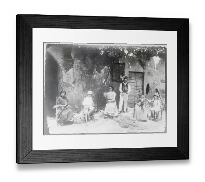 Framed Print : Hat Makers Sitting Outside in Front of Building Framed Print : Hat Makers Sitting Outside in Front of Building