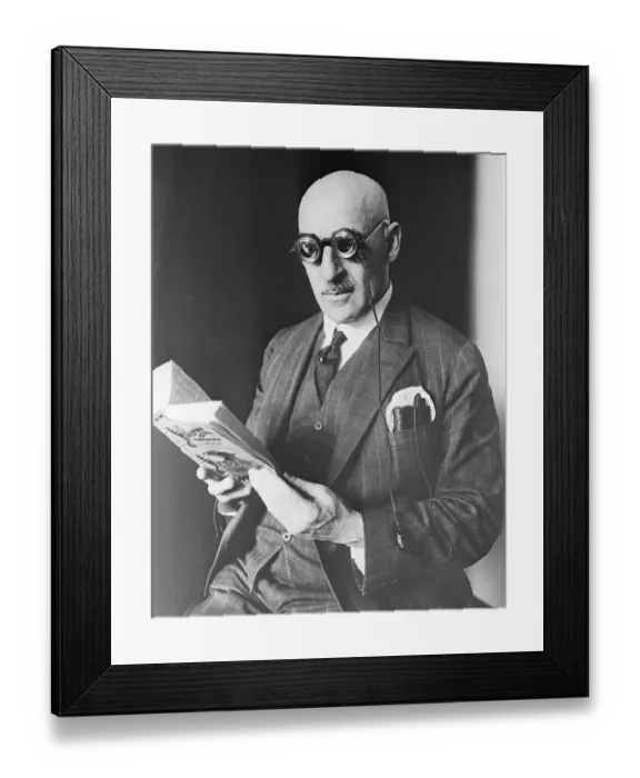 Framed Print : Man Reading with Lighted Eyeglasses Framed Print : Man Reading with Lighted Eyeglasses