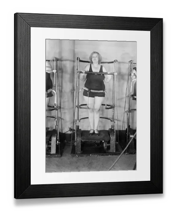 Framed Print : Woman Standing On Exercise Machine Framed Print : Woman Standing On Exercise Machine