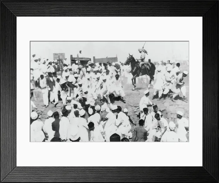 Framed Print : Indian Policeman Halting Protesters with Weaponry Framed Print : Indian Policeman Halting Protesters with Weaponry