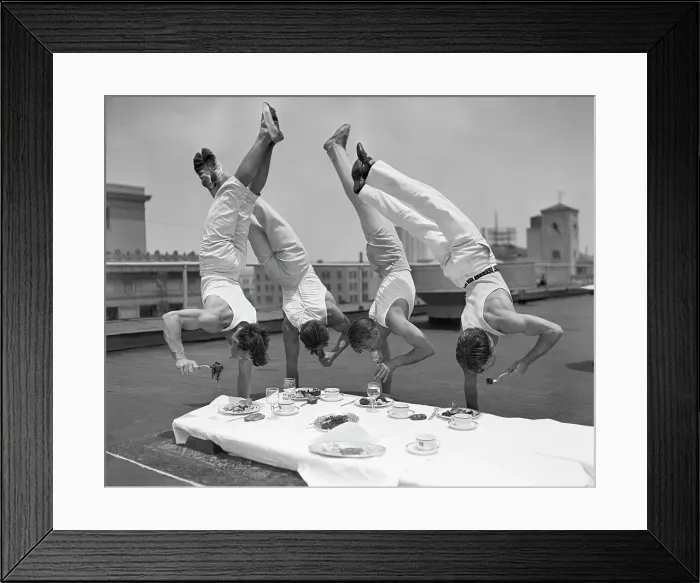 Framed Print : Acrobats Eat While Doing Handstands Framed Print : Acrobats Eat While Doing Handstands