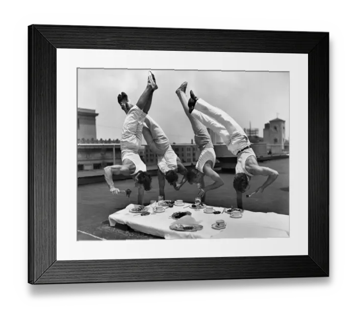 Framed Print : Gymnasts Eating While Doing Handstands Framed Print : Gymnasts Eating While Doing Handstands