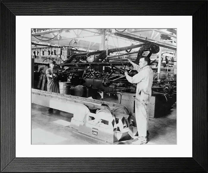 Framed Print : Men Working on an Assembly Line Framed Print : Men Working on an Assembly Line