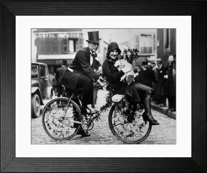 Framed Print : Bride and Groom Riding Bicycle Framed Print : Bride and Groom Riding Bicycle