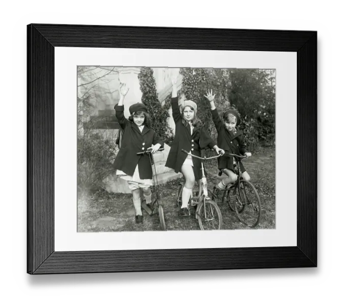 Framed Print : Children Waving from Bikes Framed Print : Children Waving from Bikes
