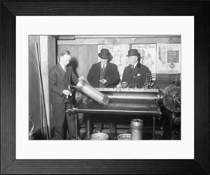 Framed Print : Men Place Mail in Pneumatic Tube Machine Framed Print : Men Place Mail in Pneumatic Tube Machine