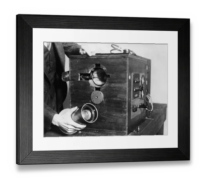 Framed Print : Close-up Hand Holds TV Transmitter Framed Print : Close-up Hand Holds TV Transmitter