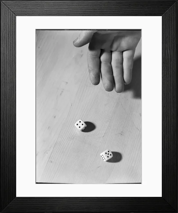 Framed Print : Hand throwing Dice Framed Print : Hand throwing Dice