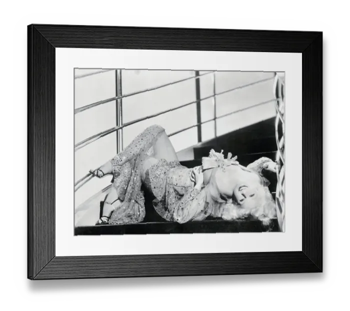 Framed Print : Actress Jean Harlow Posing on Stairway Framed Print : Actress Jean Harlow Posing on Stairway