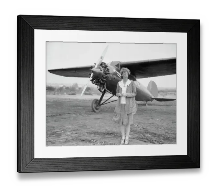 Framed Print : Amelia Earhart Posing with Her Plane Framed Print : Amelia Earhart Posing with Her Plane