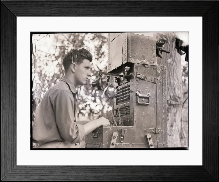Framed Print : Man Seated Behind Army Communication Equipment Framed Print : Man Seated Behind Army Communication Equipment
