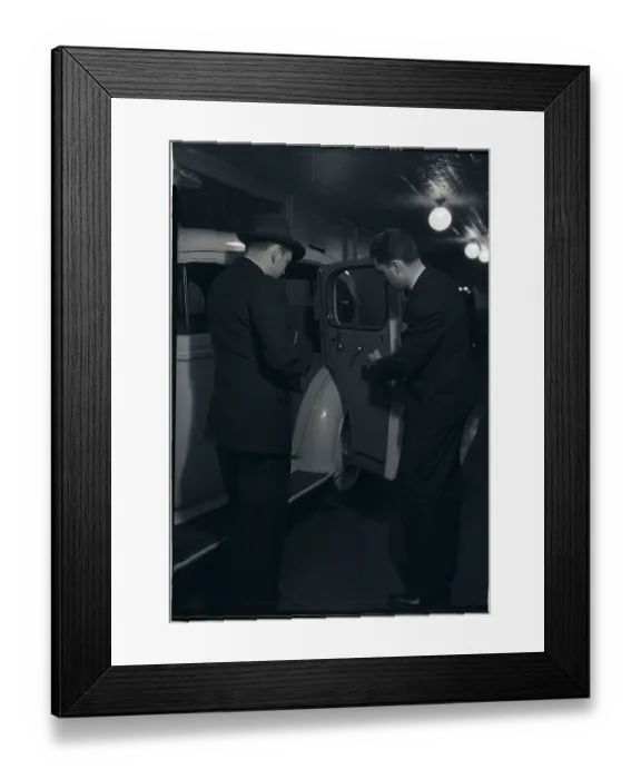 Framed Print : Man Looking at Interior of Car Framed Print : Man Looking at Interior of Car