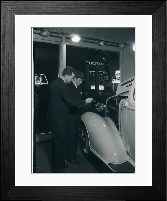 Framed Print : Man Signing Piece of Paper Framed Print : Man Signing Piece of Paper