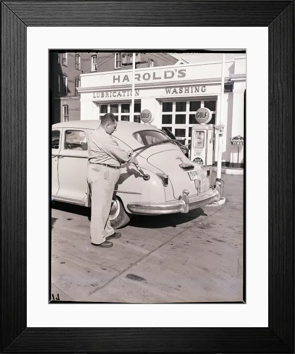 Framed Print : Man Putting Gas in Automobile Framed Print : Man Putting Gas in Automobile