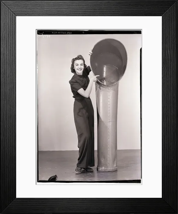 Framed Print : Woman Pointing into Vent Pipe Framed Print : Woman Pointing into Vent Pipe