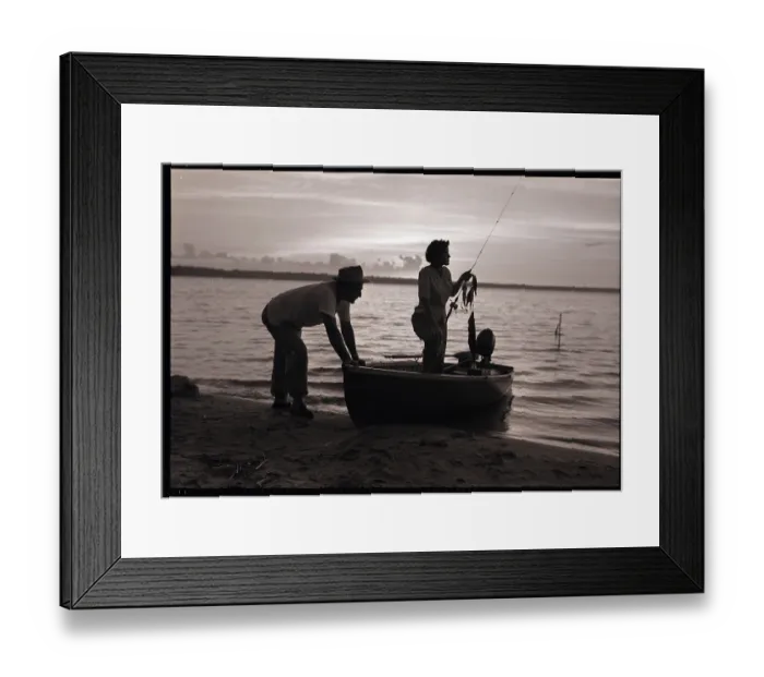 Framed Print : Couple on Lakeshore with Boat Framed Print : Couple on Lakeshore with Boat
