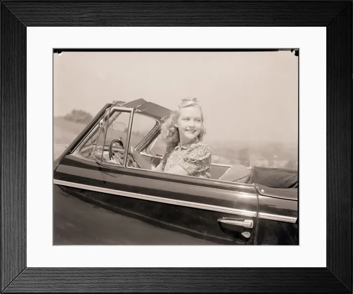 Framed Print : Blonde Woman Driving a Convertible Framed Print : Blonde Woman Driving a Convertible