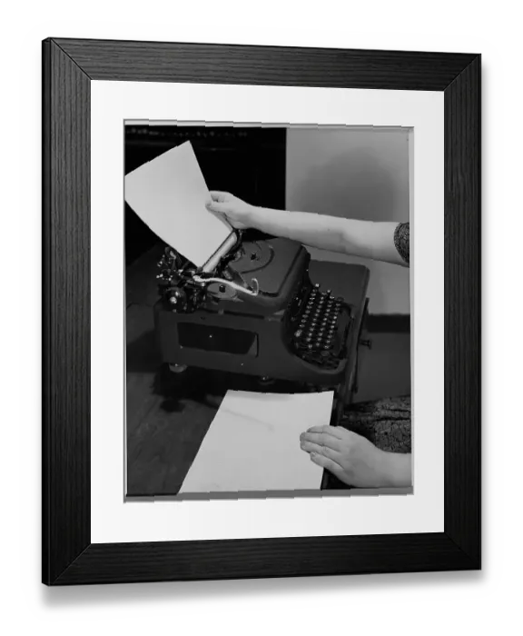 Framed Print : Loading Paper into Typewriter Framed Print : Loading Paper into Typewriter