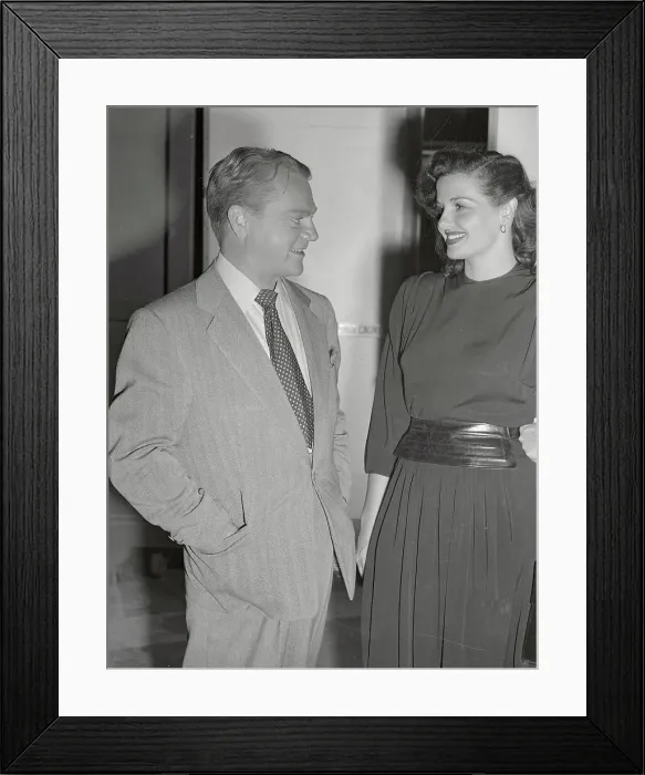 Framed Print : James Cagney Smiling at Woman Framed Print : James Cagney Smiling at Woman