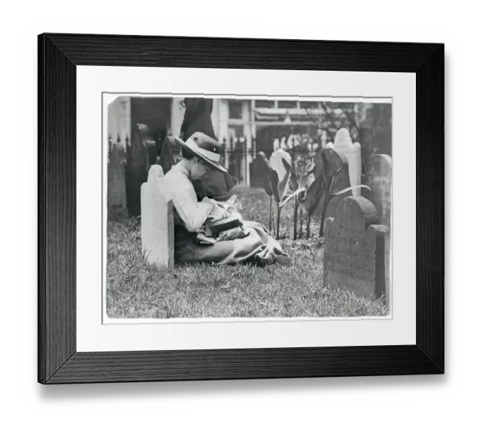 Framed Print : Young Woman Sewing Atop Grave Framed Print : Young Woman Sewing Atop Grave