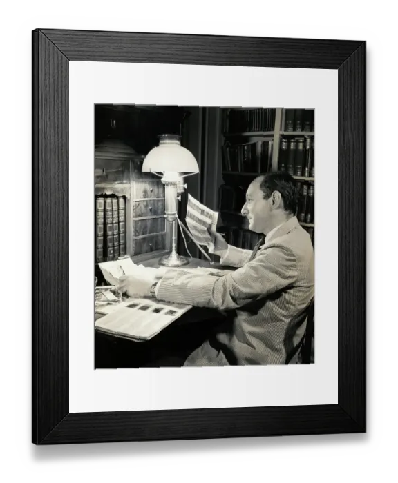 Framed Print : Otto Bettmann Examining Negatives Framed Print : Otto Bettmann Examining Negatives