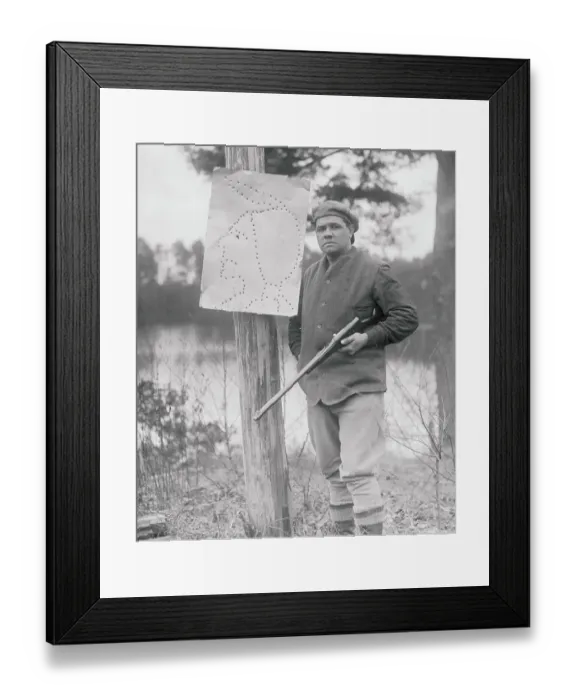 Framed Print : Babe Ruth with Rifle and Native American Target Framed Print : Babe Ruth with Rifle and Native American Target