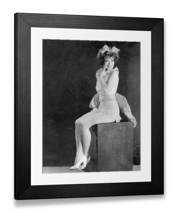 Framed Print : Clara Bow. ORIGINAL CAPTION READS: Clara Bow wearing scanty costume. Photograph Ca. 1930's Framed Print : Clara Bow. ORIGINAL CAPTION READS: Clara Bow wearing scanty costume. Photograph Ca. 1930's
