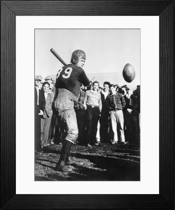 Framed Print : Babe Ruth Playing Football with Bat Framed Print : Babe Ruth Playing Football with Bat
