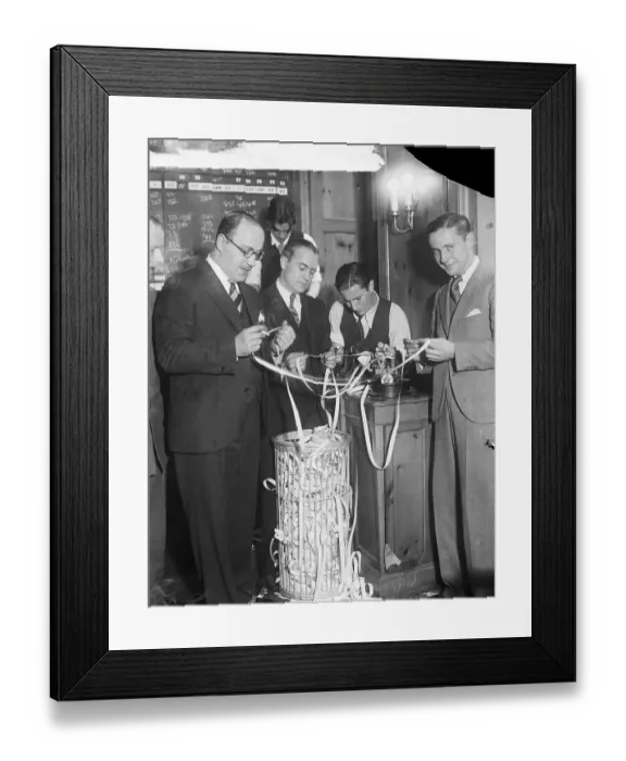 Framed Print : Traders Looking at Ticker