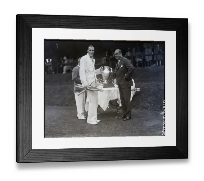 Framed Print : Tennis Winner Is Presented With Cup