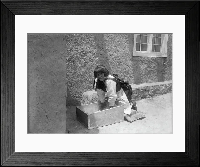 Framed Print : Zuni Woman Grinding Corn