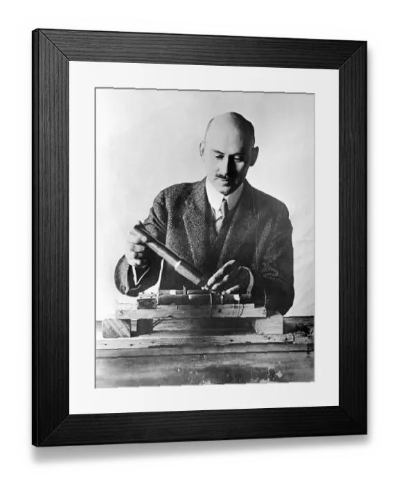 Framed Print : Scientist Displaying Moon Rocket Framed Print : Scientist Displaying Moon Rocket