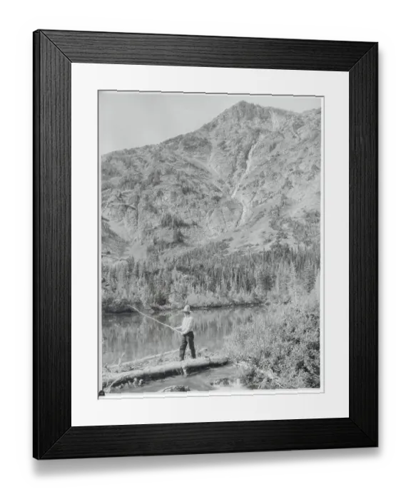 Framed Print : Man Fishing at a Lake Framed Print : Man Fishing at a Lake