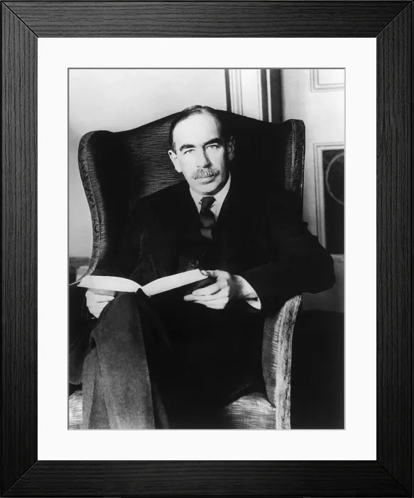 Framed Print : J.Maynard Keynes Holding a Book Framed Print : J.Maynard Keynes Holding a Book