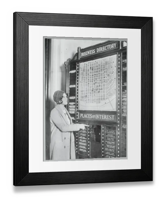 Framed Print : Woman Using an Electronic Business Directory Framed Print : Woman Using an Electronic Business Directory