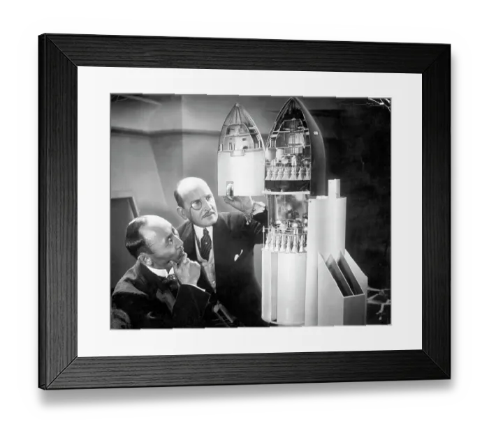 Framed Print : Men Inspecting Rocket Ship Model Framed Print : Men Inspecting Rocket Ship Model