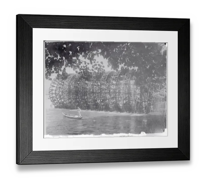Framed Print : Bamboo Water Wheel and Boater Framed Print : Bamboo Water Wheel and Boater