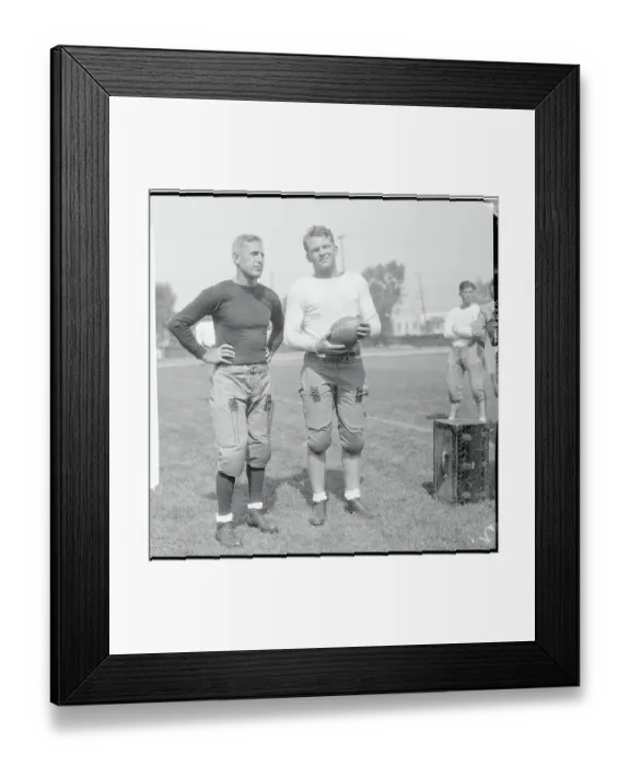 Framed Print : Football Coach with One of His Teammates Framed Print : Football Coach with One of His Teammates