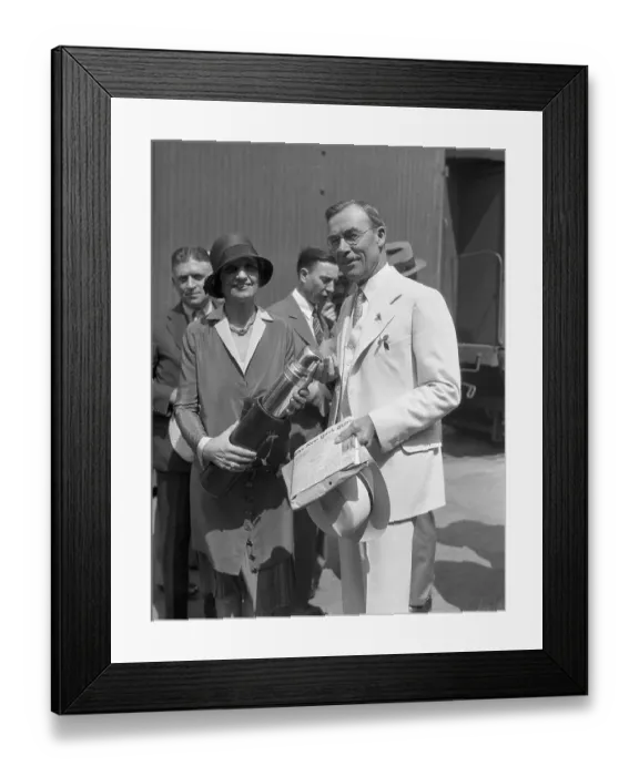 Framed Print : Mabel Walker Presenting a Bottle of Water to a Colleague