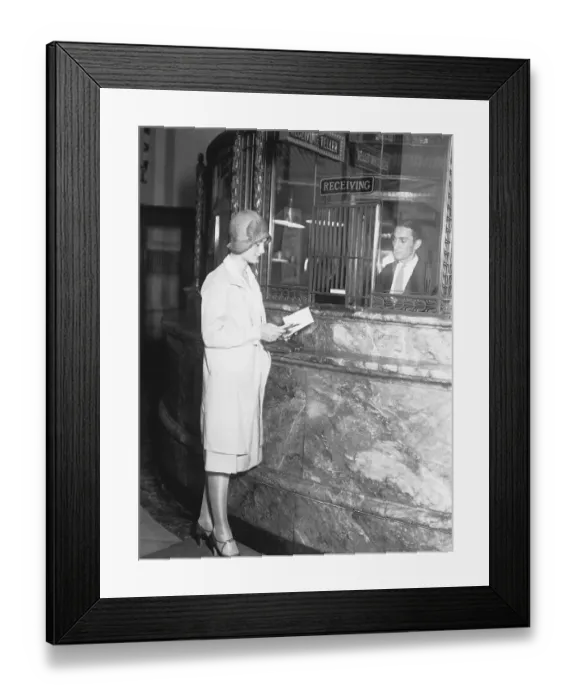Framed Print : Woman at Teller's Cage in Bank Framed Print : Woman at Teller's Cage in Bank