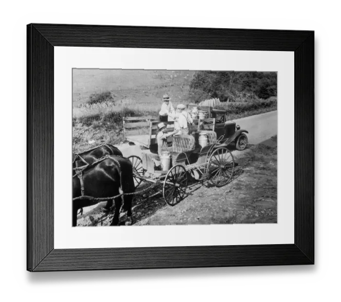 Framed Print : Farmers Handing Milk Cans to Delivery Driver Framed Print : Farmers Handing Milk Cans to Delivery Driver