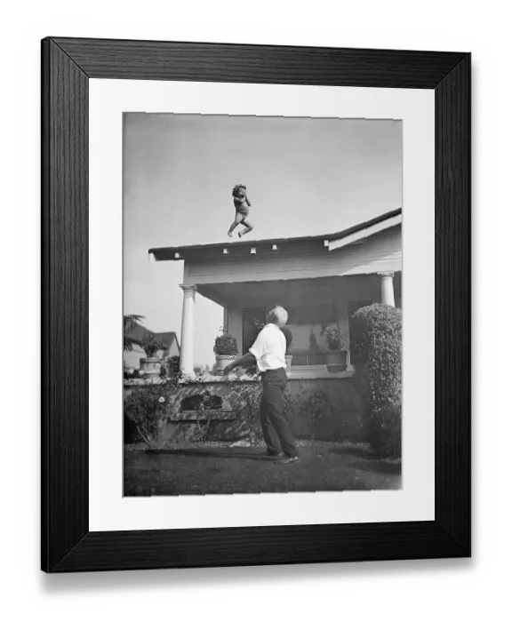 Framed Print : Father Tossing His Daughter into the Air Framed Print : Father Tossing His Daughter into the Air