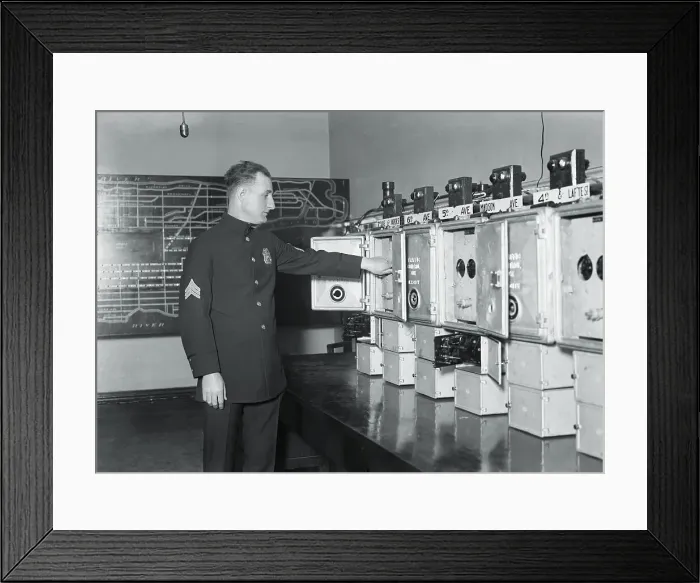 Framed Print : Police Officer Operating Traffic Lights Framed Print : Police Officer Operating Traffic Lights